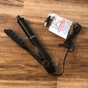 The InStyler MAX hair rotating curling iron.